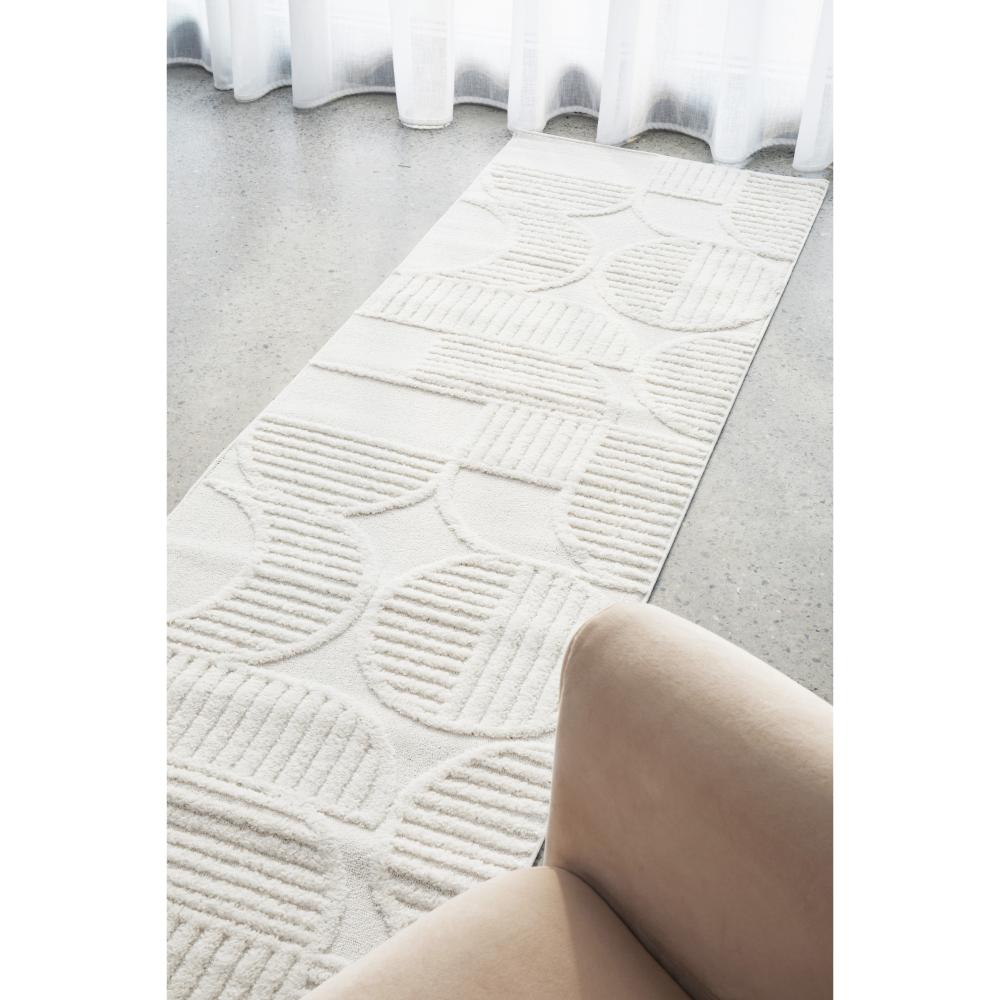 Rug Culture Lotus Leo Runner in White in lounge room at House