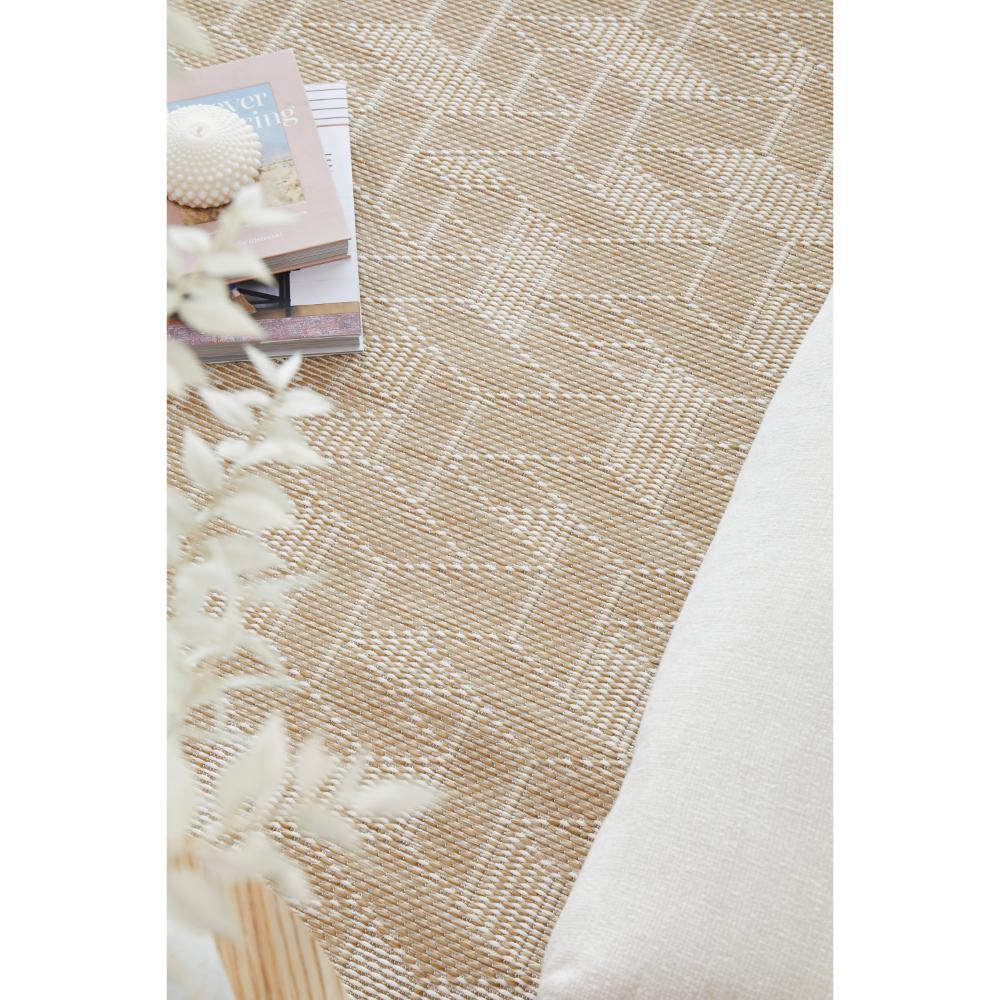 Natural Brown weave look hallway floor runner rug with stack of books - House