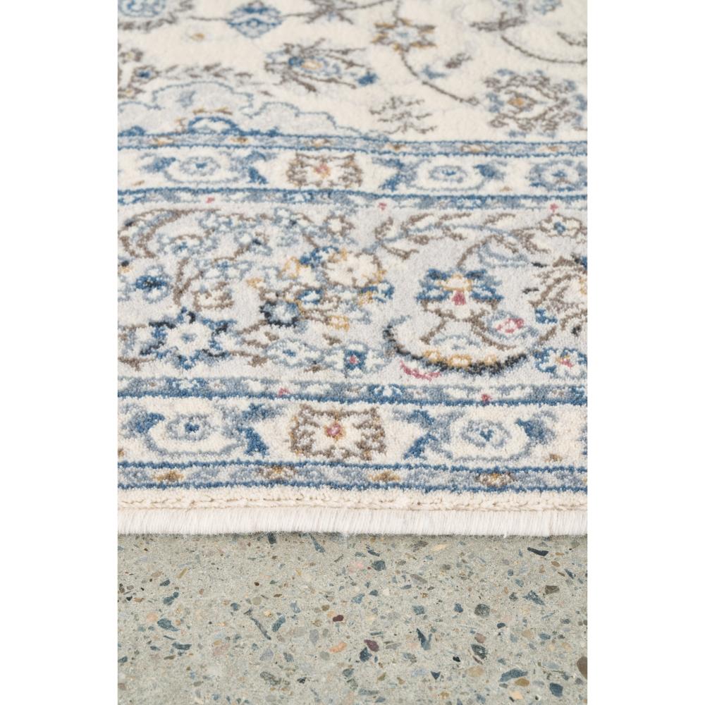 Traditional look blue and cream wool rug detail image - House