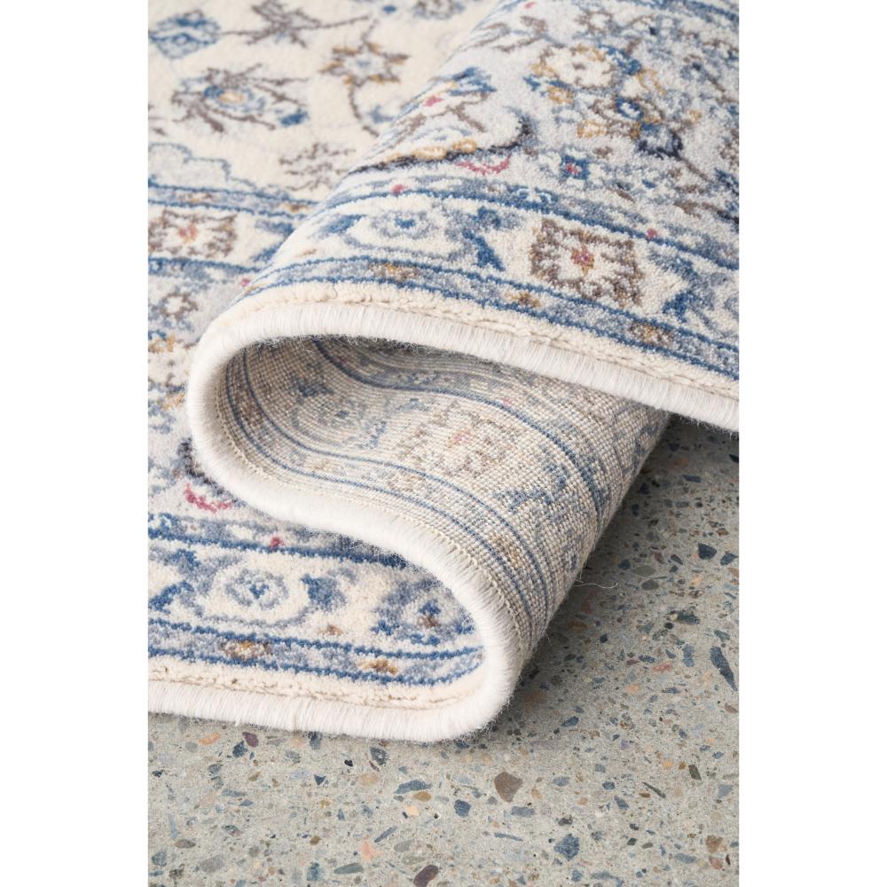 Traditional look blue and cream wool rug detail image - House