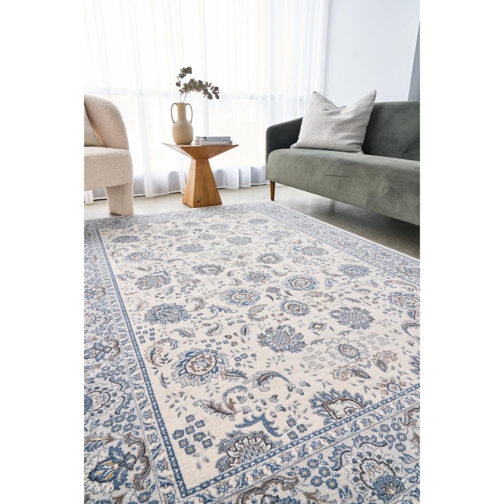 blue and white floral rug in lounge room - House