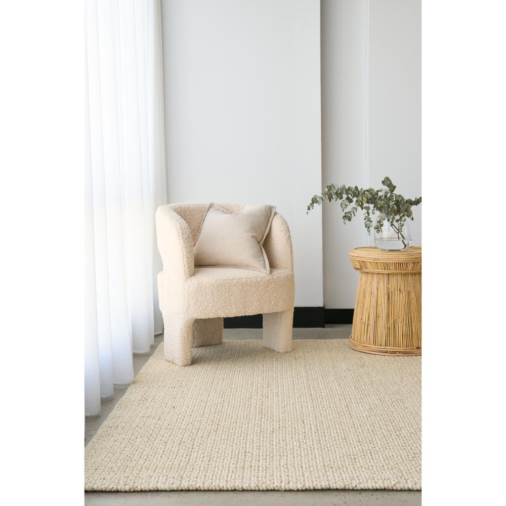 cream beige hamptons style jute wool rug with boucle chair - House