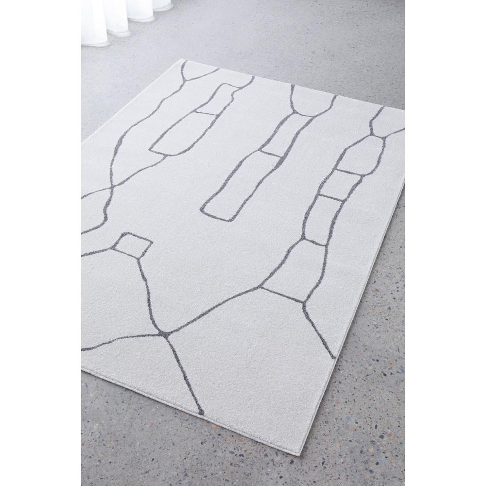grey modern abstract rug by the window - House