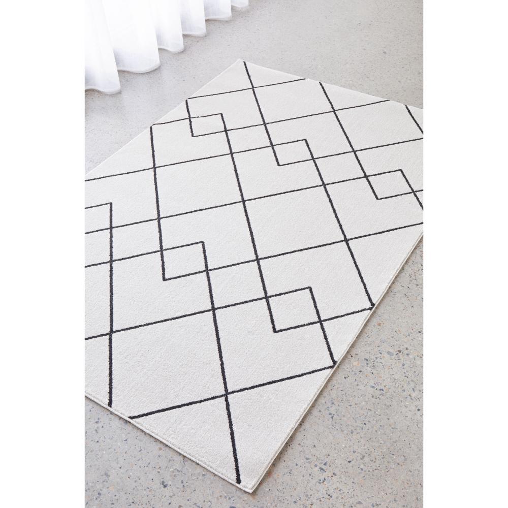 grey modern abstract rug by the window - House