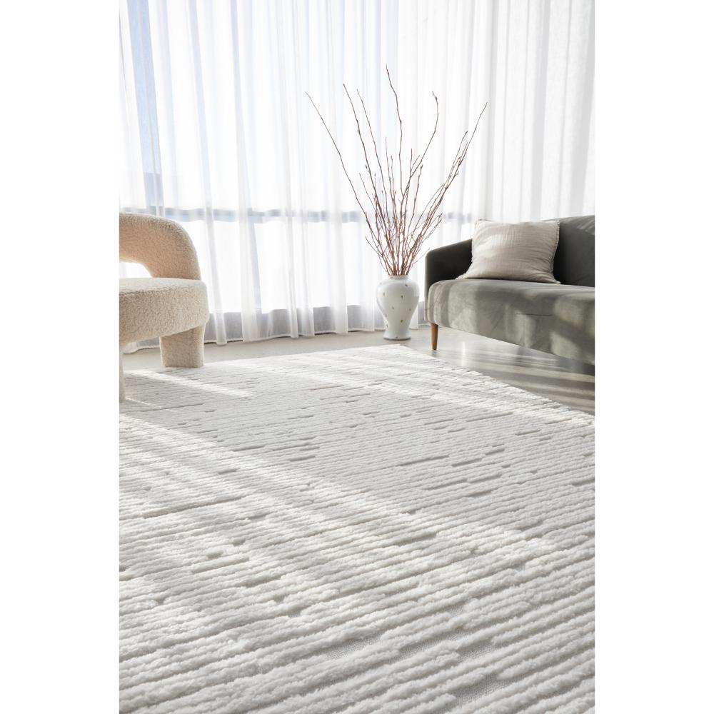 Rug Culture Marigold Suri Rug White in lounge room at House