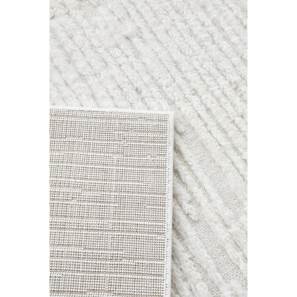 Rug Culture Marigold Suri Rug White underneath rug at House