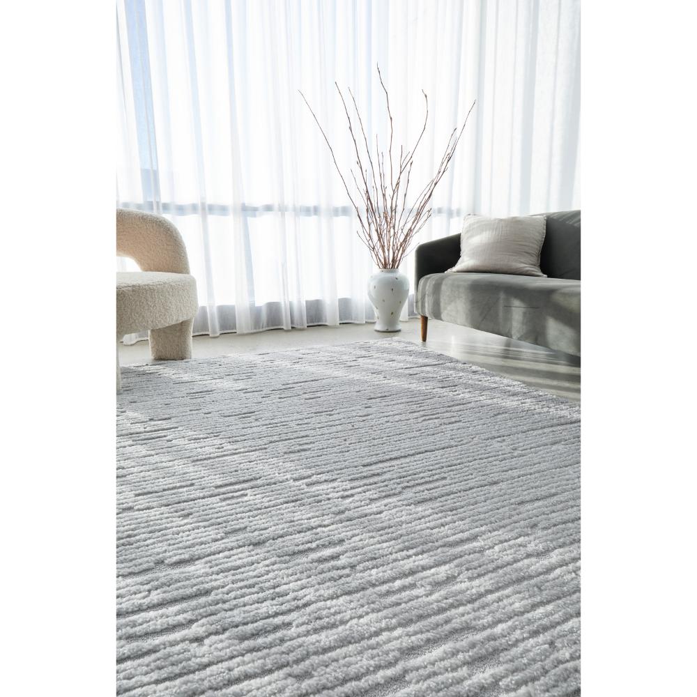 Rug Culture Marigold Suri Rug Silver in lounge room at House