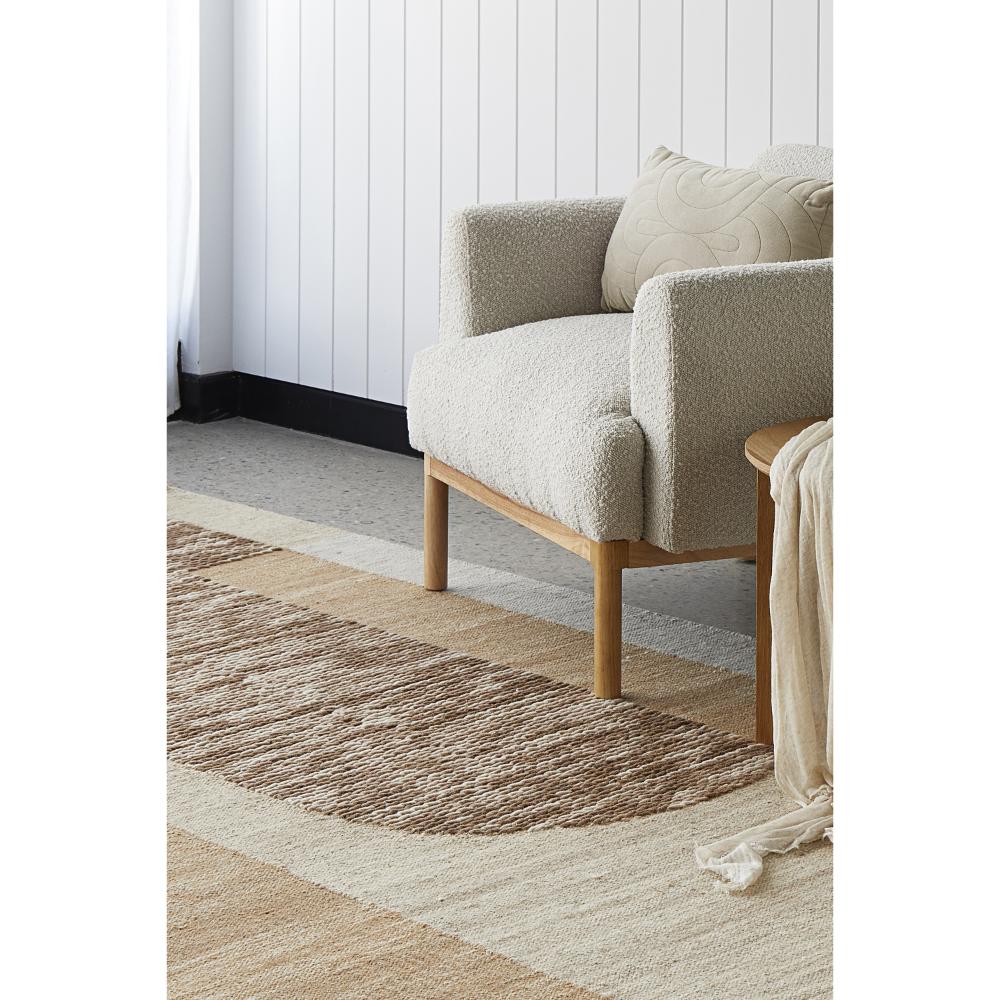 Rug Culture Summit Orb Rug Toffee Brown with a chair at House