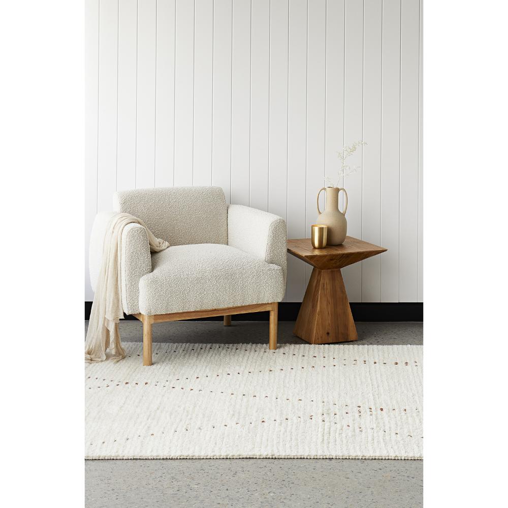 Rug Culture Summit Daina Wool Rug Natural with boucle chair at House