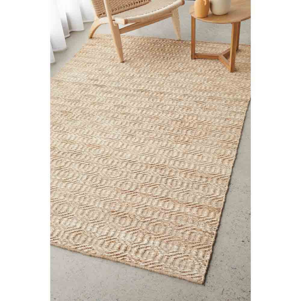warm beige honeycomb patterned jute rug with armchair - House