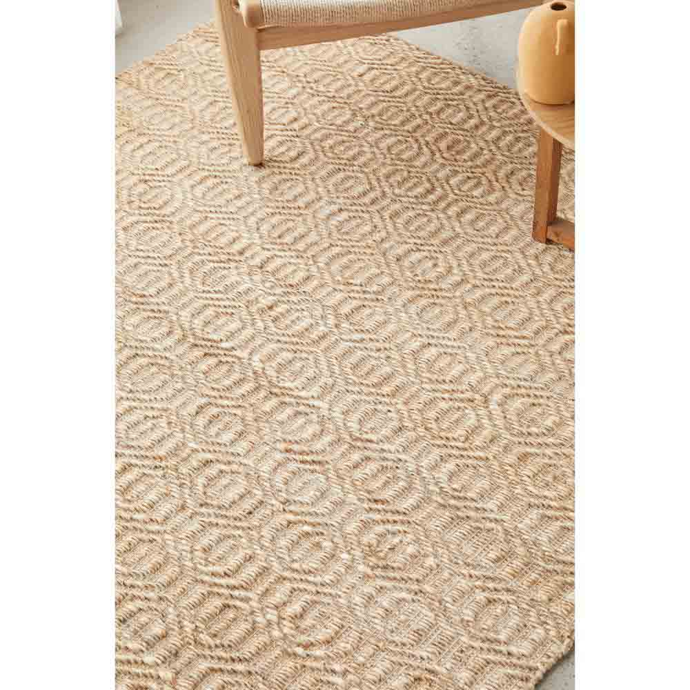 warm beige honeycomb patterned jute rug with armchair - House