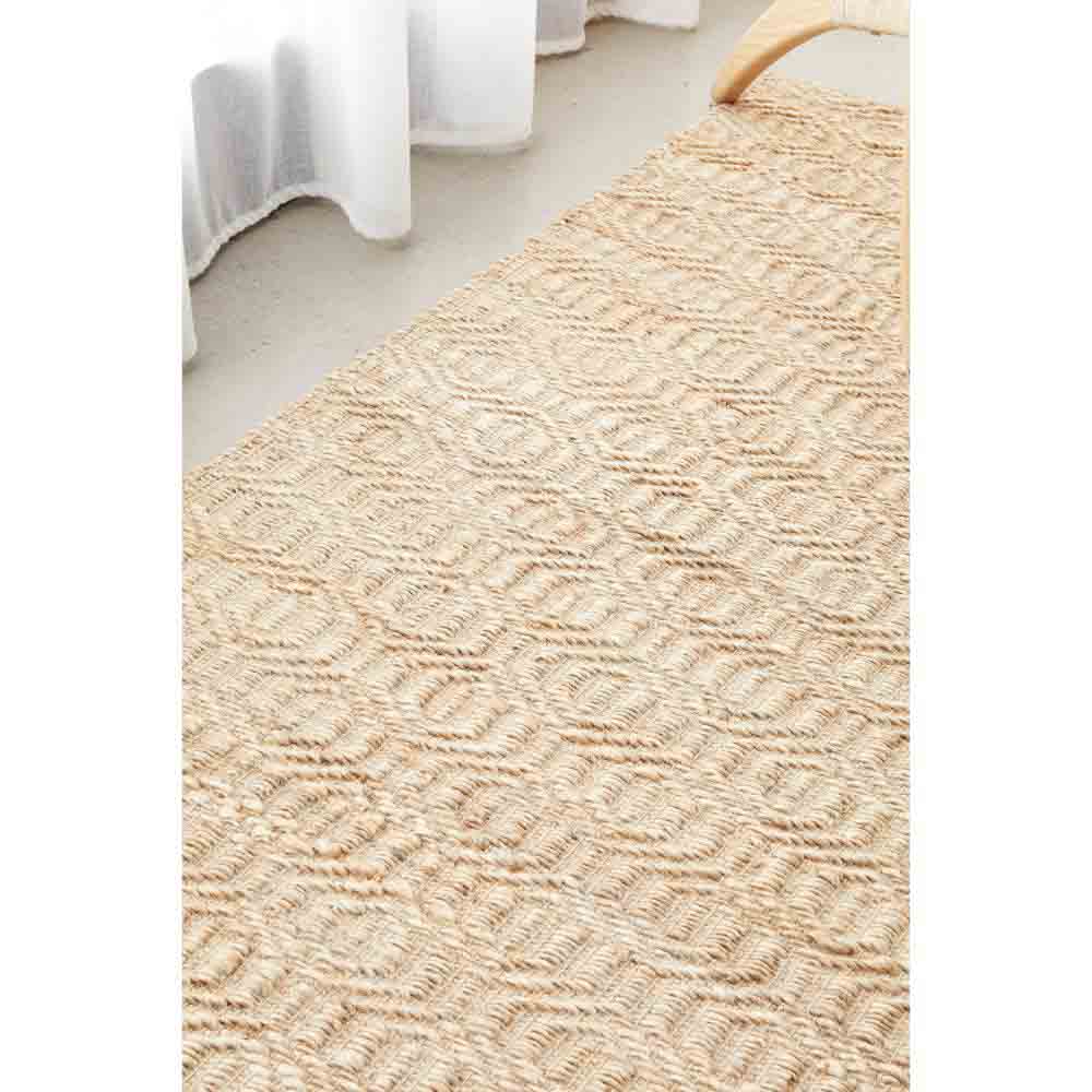 warm beige honeycomb jute rug by the window - House