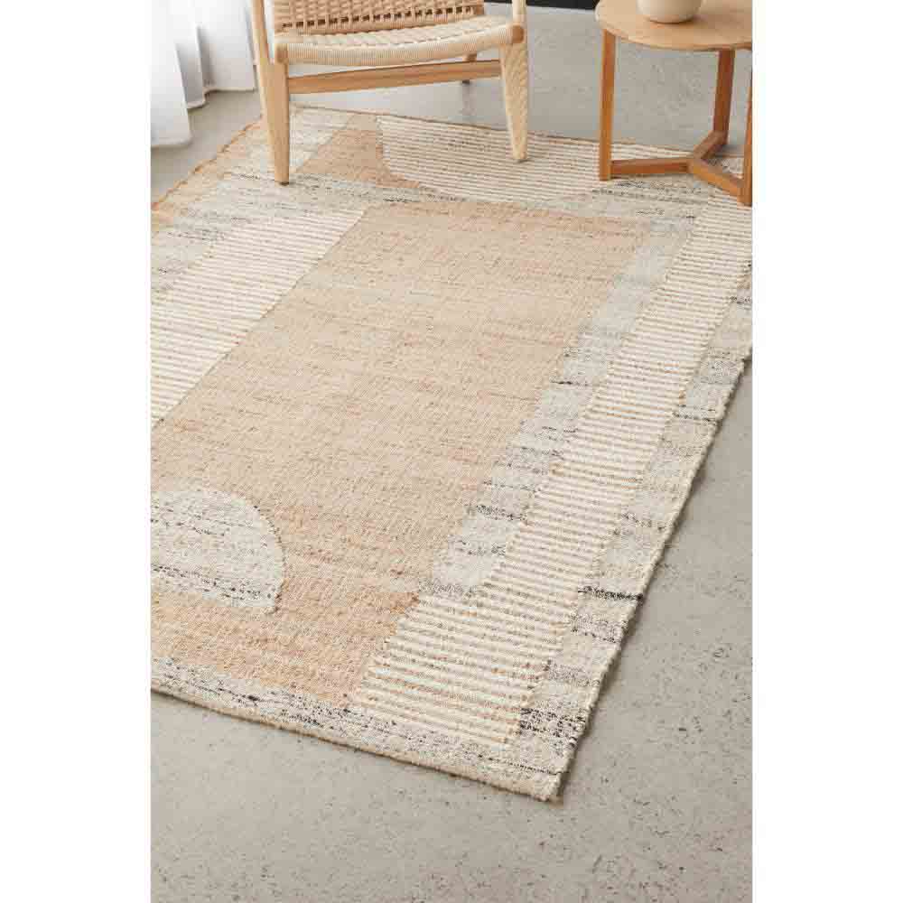 warm beige abstract jute wool rug with armchair - House
