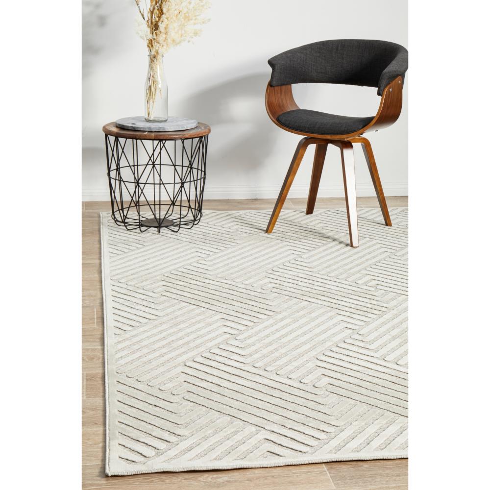 natural beige chevron rug with armchair and side table - House