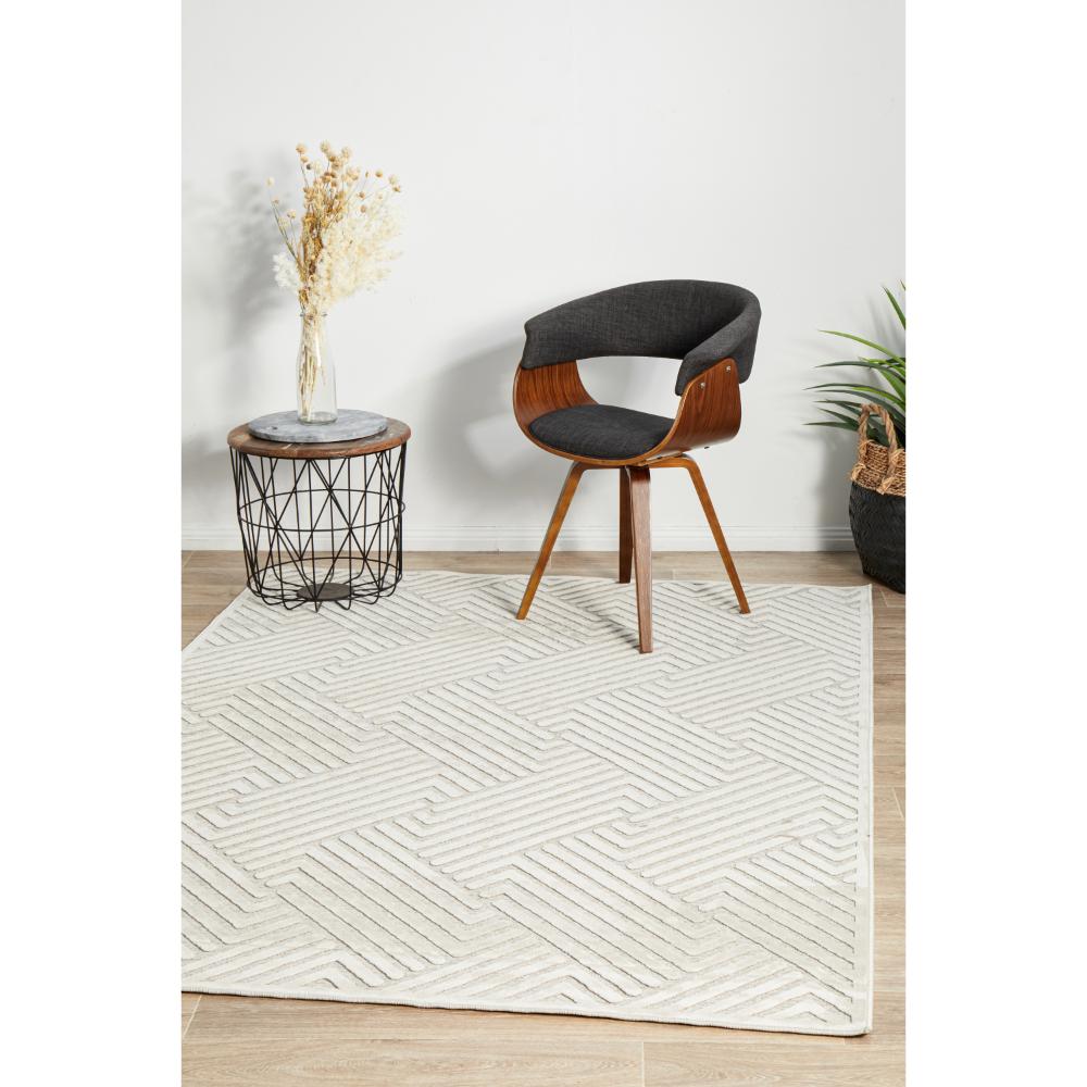 natural beige chevron rug with armchair and side table - House