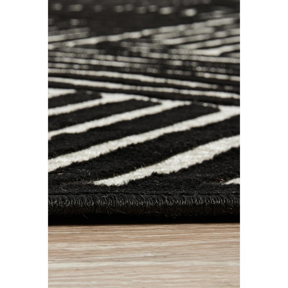 black and cream chevron patterned rug detail image - House