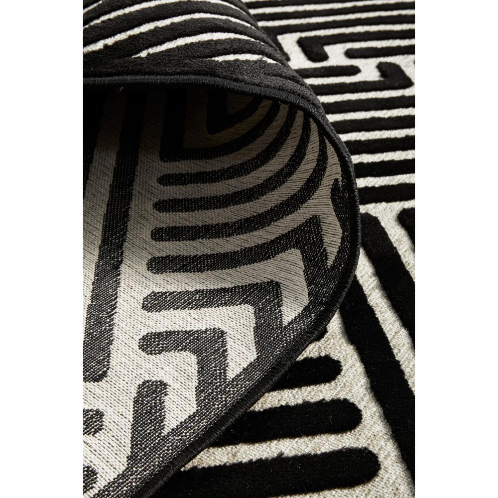 black and cream chevron patterned rug detail image - House