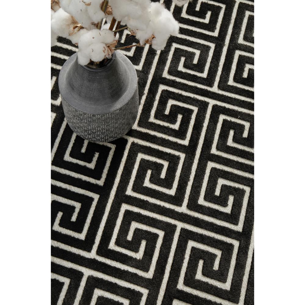 black and beige geometric swirl rug detail image - House