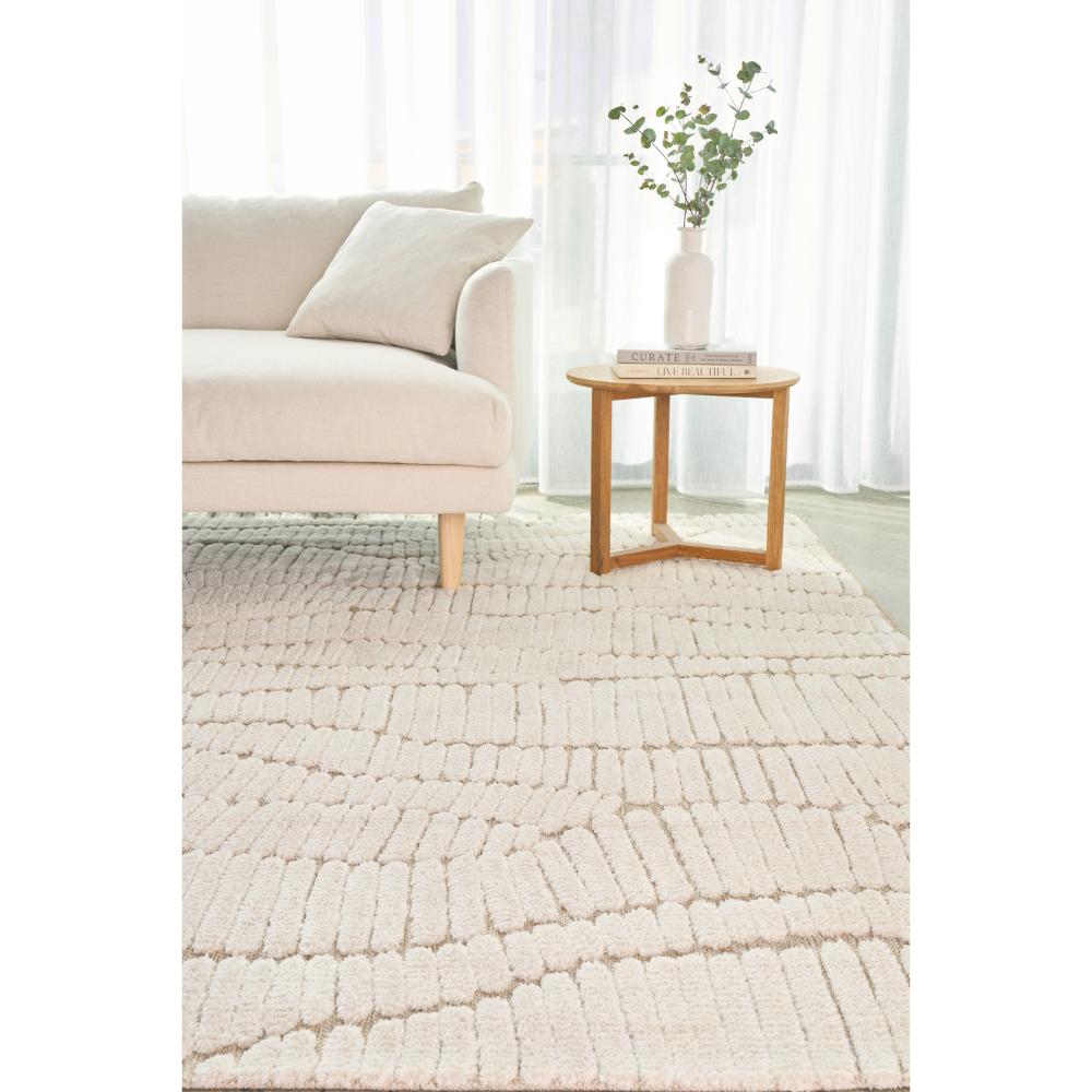 Natural beige waves rug with lounge and side table - House