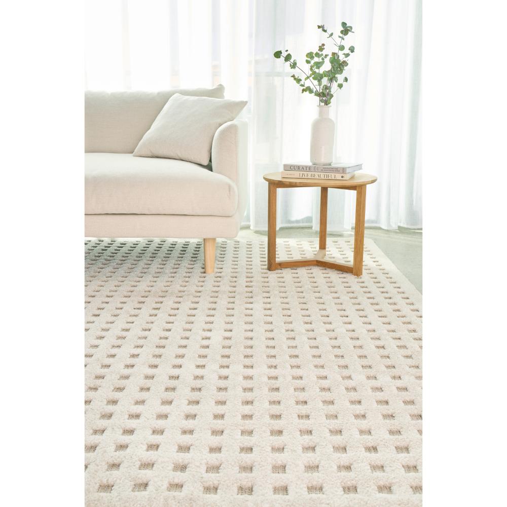 Natural beige small grid rug with lounge and table - House