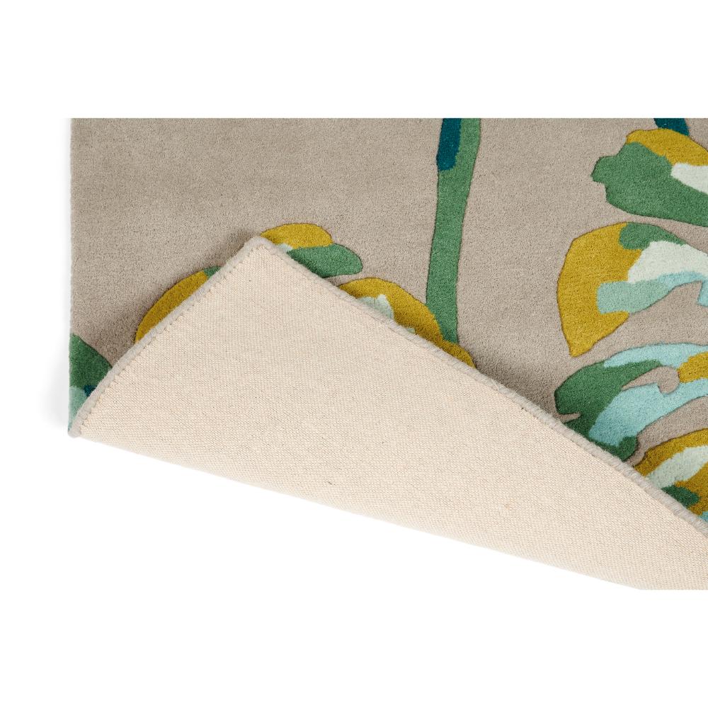 Cream and green palm leaf designer wool rug detail shot - House