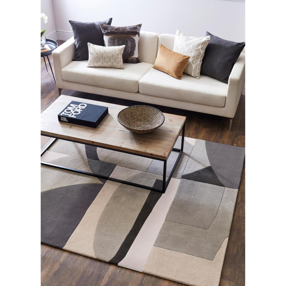 Grey Patterned Wool Rug with lounge and coffee table - House