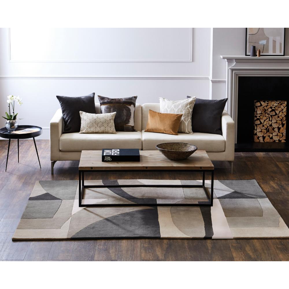 Grey Patterned Wool Rug with lounge and coffee table - House