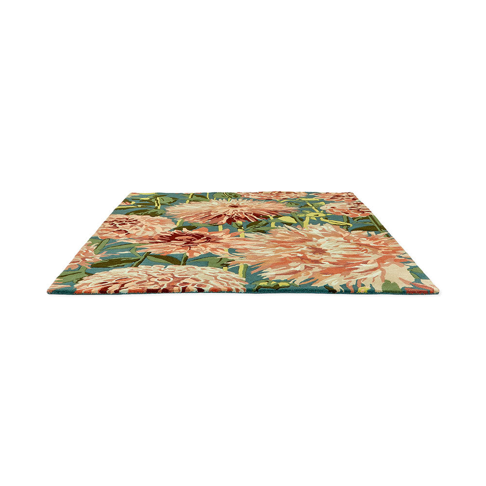 designer large orange dahlia flower wool rug angled shot - House