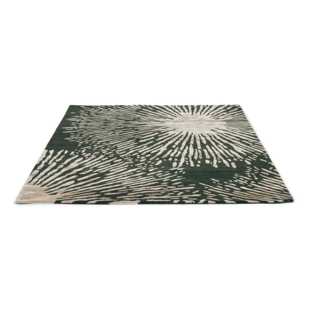 grey starburst designer wool rug in angled image - House