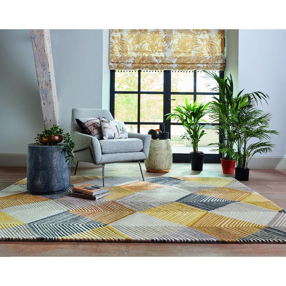 Abstract wool rug in sun drenched sitting room - House