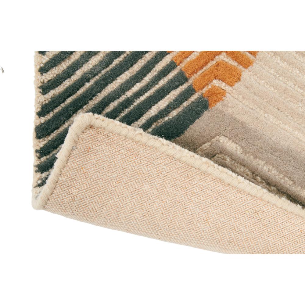 Abstract tan, grey and yellow wool rug detailed image - House