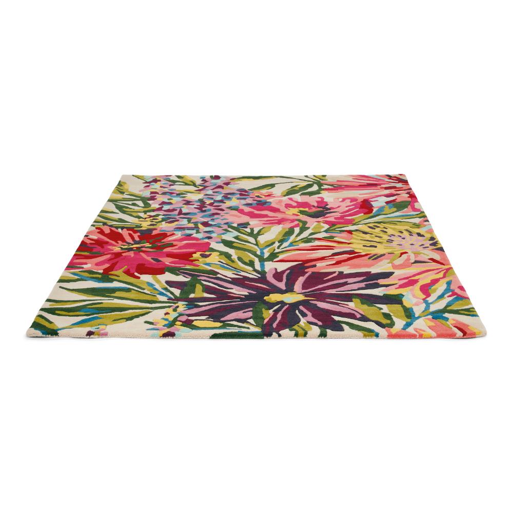 vibrant pink and purple flower wool rug  angled image - House