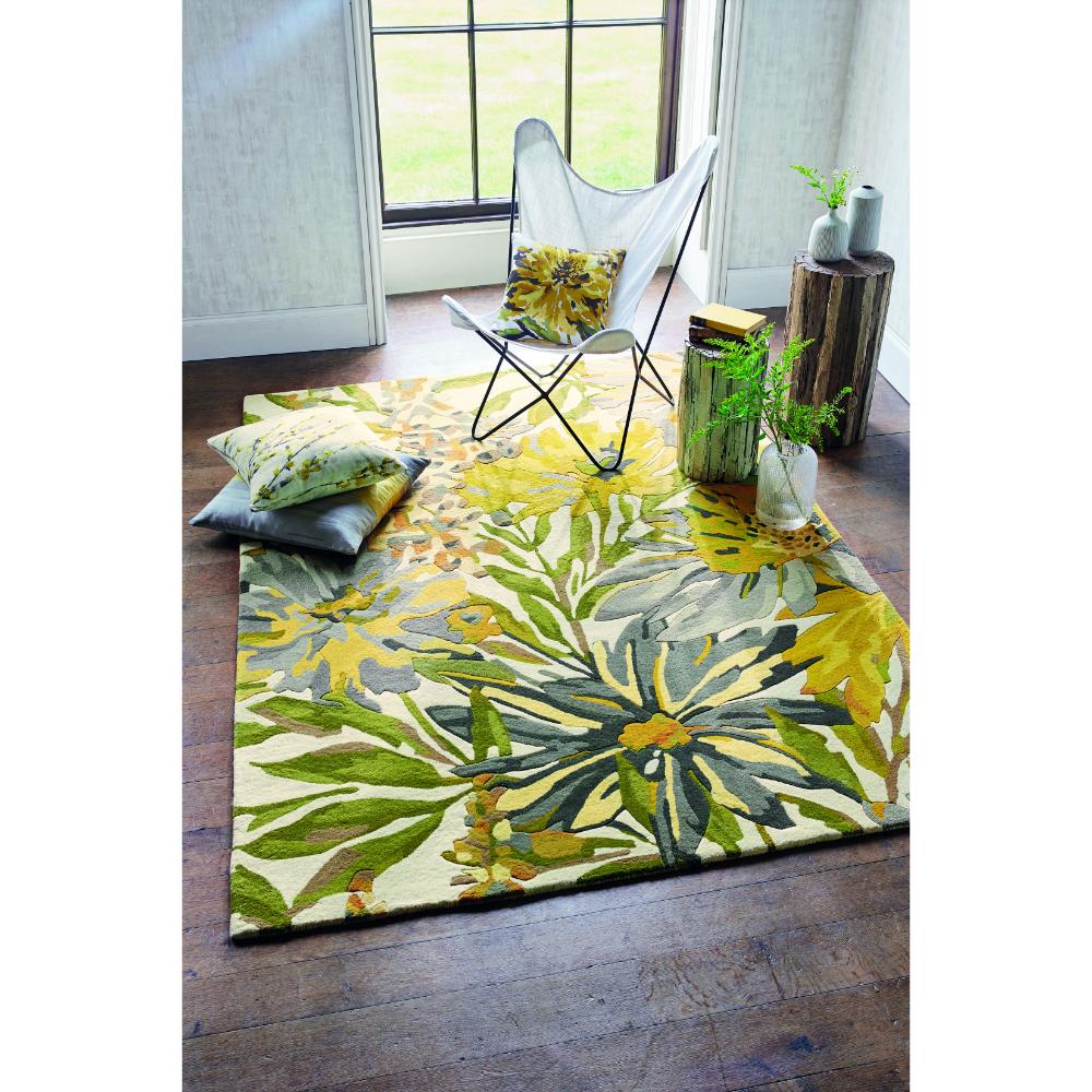 yellow and green flower wool rug with sling armchair - House