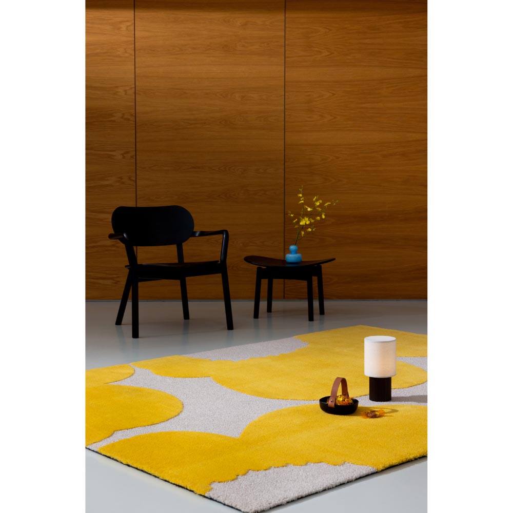 Marimekko Iso Unikko Rug Yellow. Cream rug with enlarged yellow flowers