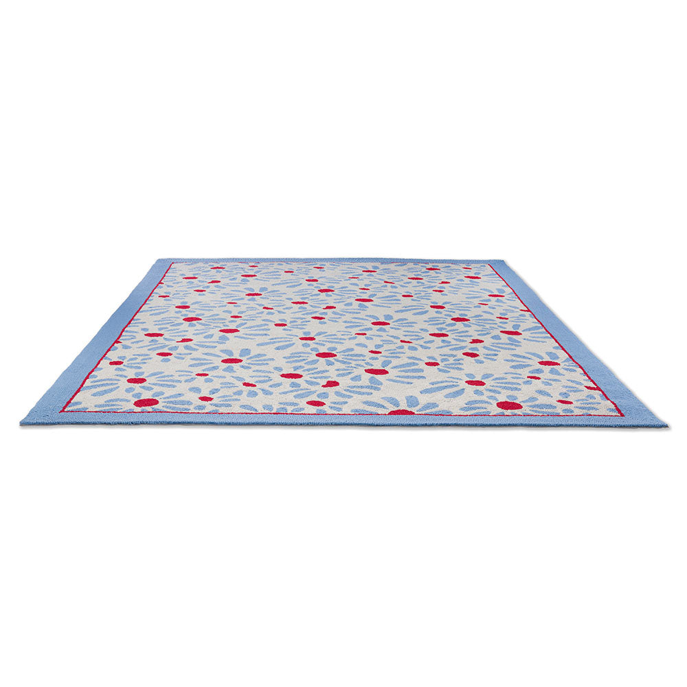 Blue daisies indoor/outdoor rug angled image - House