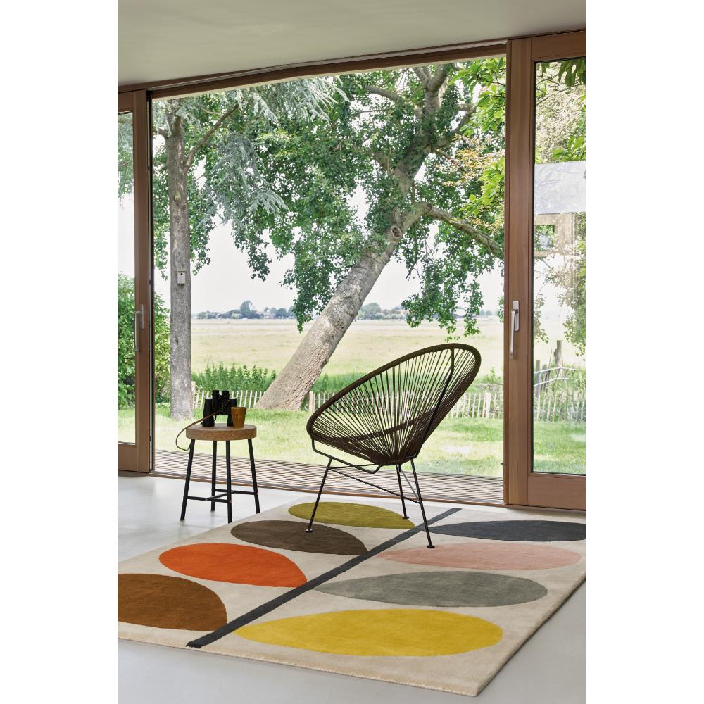 multi coloured long stem flower wool rug in indoor patio - House