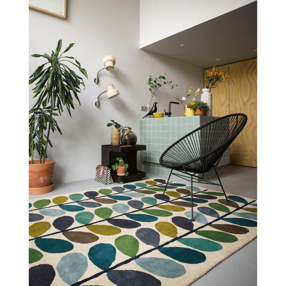blue and green flower stem rug in living room - House