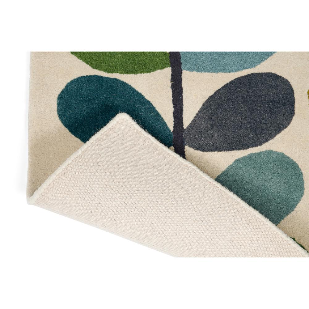 blue and green flower stem rug detailed image - House