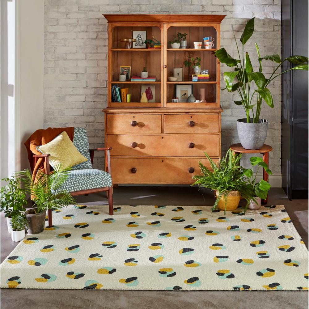 Cream Leopard Dots Wool Rug in sitting area - House