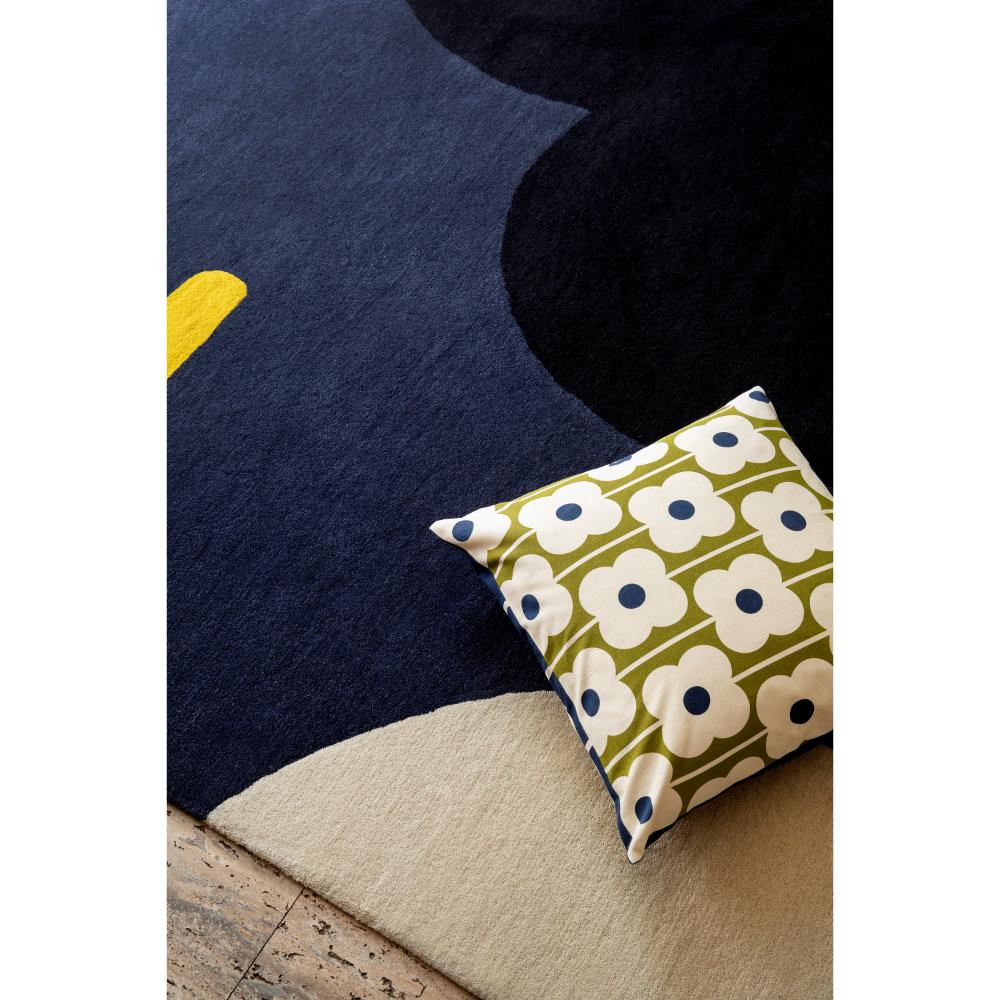 Blue Flower Wool Rug with green flower cushion - House