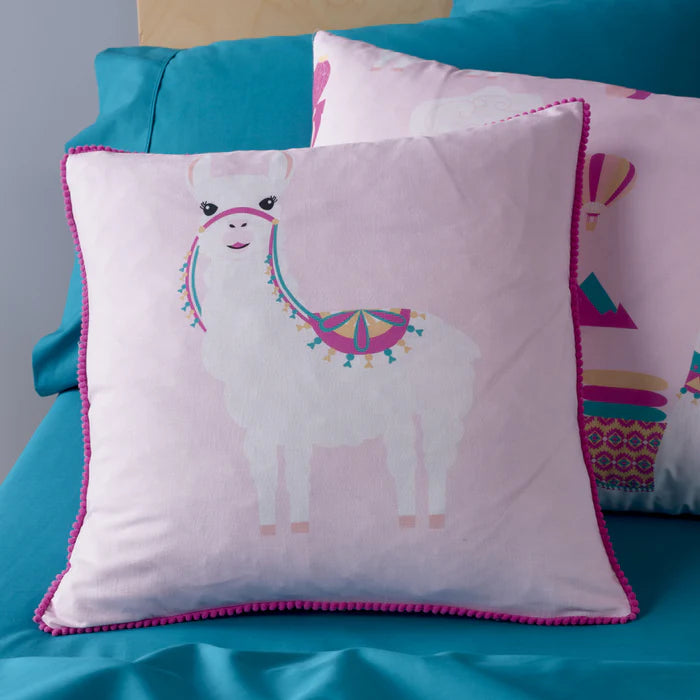 Decorative pillow with llama design on a blue background