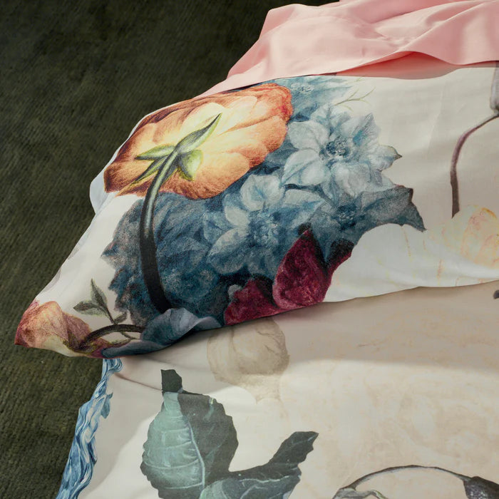 Floral patterned fabric with a focus on blue and pink colors.