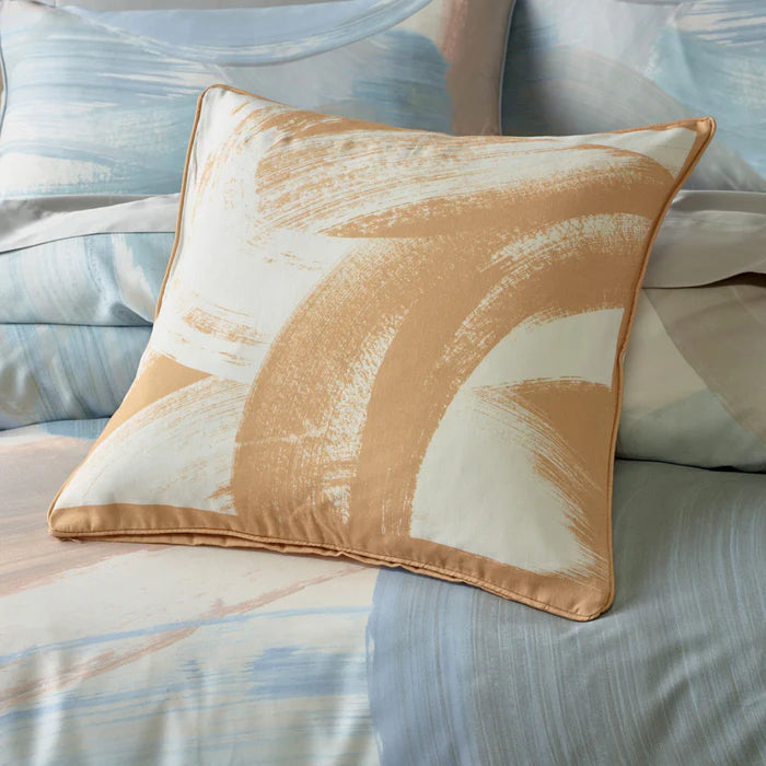 Decorative pillow with abstract design on a sofa