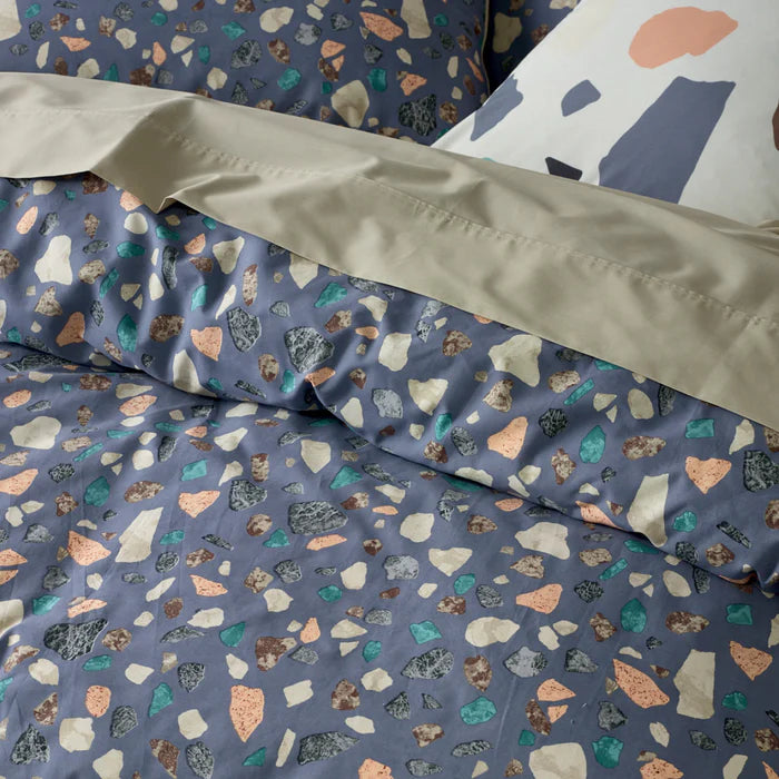 Terrazzo patterned bedding set with a blue background