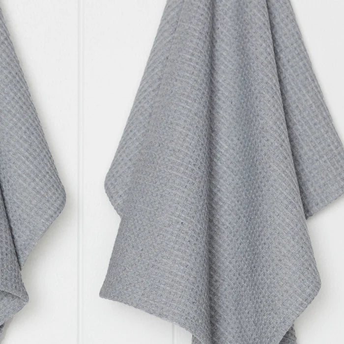 Gray textured towel on a white background