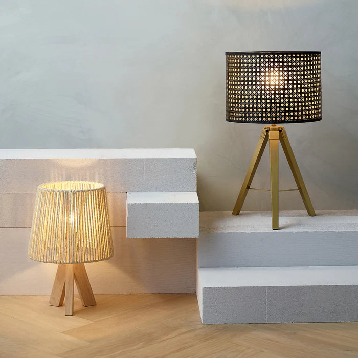 Two table lamps with woven shades on a neutral background